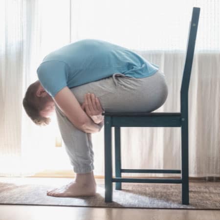 Balasana modification using chair